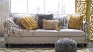 Standard living room armchair with 2 pillows (light grey). 5 Ways To Decorate A Neutral Sofa With Throw Pillows Hayneedle