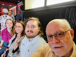 Here's my family. Quick history: Graduated from Purdue in '80. I moved to  Indy in '86 to start a career in charitable fundraising. I met my wife  Julie where we both worked.