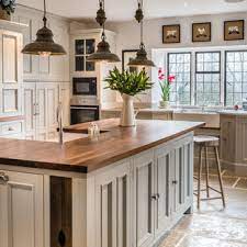 With tons of kitchen organization options like pull out cabinet and drawer organizers, spice racks, cabinet organizers, and more, all of your kitchen necessities will be tucked neatly away. 75 Beautiful Farmhouse Kitchen With Wood Countertops Pictures Ideas July 2021 Houzz
