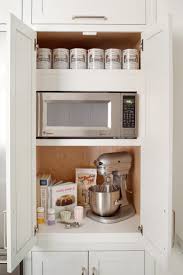 They're specially designed for our range and most of them include additional storage for cooking equipment. 11 Strategies For Hiding The Microwave Remodelista