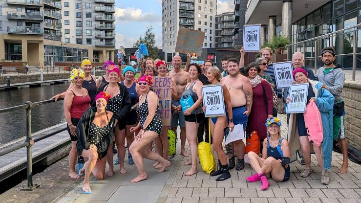 Protest over closure of open water swimming spot at Leeds Dock - BBC News