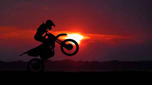 Wallpaper Motorcycle Motorcyclist Cross Stunt Silhouette Sunset Hd Picture Image Bike Silhouette Motorcycle Wallpaper Motorcycle Pictures