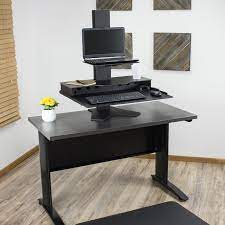 We feature the best standing desks on the market, for people looking to be healthier by sitting less to work at their computers, whether in the office or in the home. The Duke Platform Desktop Standing Desk For Laptops