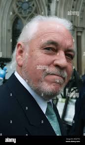 Gary Brooker, front man in rock group Procol Harum arrives at London's high  court Tuesday Nov. 14, 2006. Two former 1960s rock stars appeared before a  music-loving judge Monday for a showdown