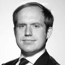 Justice Dept. charges two Russian media operatives in alleged scheme