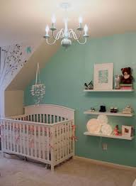 From painted dressers to fun accents walls, we're seeing tons of turquoise in the nursery. Clara S Thrifted Gifted Nursery Turquoise Nursery Girl Room Nursery