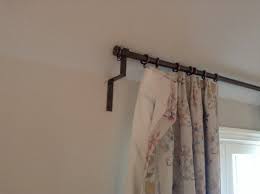 Not that i would swing a cat. Need A Curtain Rod Bracket For Sloped Ceiling