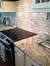 Fantasy Grey Granite With White Cabinets