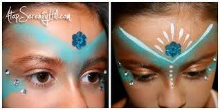 A cross is elongated from the base of the nape going down the middle and towards the lower back. Halloween Face Painting Fairies And Princesses Atop Serenity Hill
