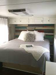 Here is an rv bedroom that utilizes shutters like the ones above as well as distressed wooden boxes and beach wood wallpaper. Pin On Road Trip