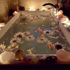 Woman preparing wellness bath with flowers, candles and fragrance oil in tub. Candles Flowers Romantic And Bath Image 6211848 On Favim Com