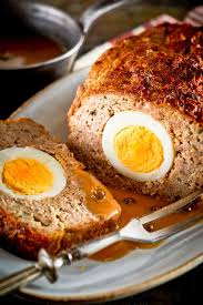 Beef Pork Meatloaf Hard Boiled Eggs Pressed Right Into The Meatloaf Make Some Unique Looking Slices Just The Right In 2020 Vegetable Snacks Pork Meatloaf Recipes