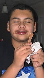 Grandson enjoying ice cream moment