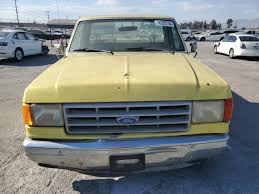 Image result for Bright Yellow 1990 Truck