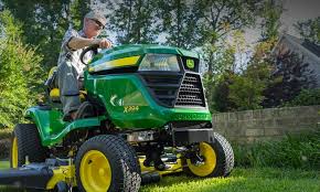 the history of john deere riding mowers 1960s to 2000s