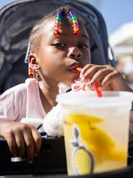 Food trucks cook through the heat at Uptown Farmers Market in Phoenix