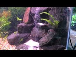 Make An Underwater Waterfall For Cheap The Effect Is Actually Created With Sand And An Air Pump Underwater Waterfall Fish Tank