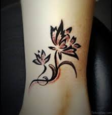 Nowadays they combine the style of original tribes and modern features. 35 Cute Lotus Tattoos On Ankle