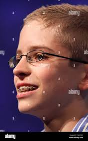 Dakota Jones, 14, from Las Vegas, Nev., spells his word during the  semifinals of the National Spelling Bee, in National Harbor, Md., Thursday,  June 2, 2011. (AP Photo/Jacquelyn Martin Stock Photo