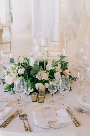 Round Table Wedding Centrepieces With Greenery Glass Candle Holders And Blush Flowers In 2020 Round Wedding Tables Wedding Centerpieces Wedding Table