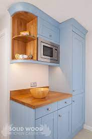Blue wine goblets, £6.50 each, www.divertimenti.co.uk. Painted Oak Shaker Kitchen In Farrow Ball Lulworth Blue Curved Kitchen Small Kitchen Units Solid Wood Kitchen Cabinets