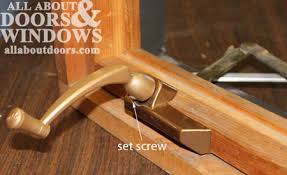 After the wooden piece is removed, unscrew the screws holding the old broken crank piece. Replacing Glass Surrounds In Door Sidelites Door Lites And Transoms