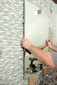 The space is measured, and a dry layout is done nearby. Consider Your Options For Glass Tile Backsplashes