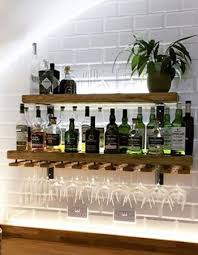 It features the glass holder, wooden structure and elegant, simple design. Rustic Reclaimed Wood Shelving
