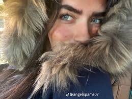 Angie's new tiktok post with fall parka pics