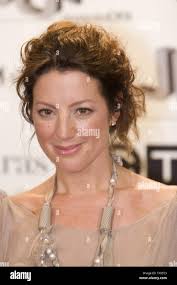 Sarah McLachlan (L) celebrates winning the Allan Waters Humanitarian Award  with presenter Terry McBride the CEO of her Record label Nettwerk Music  Group at the 2009 JUNO Gala Dinner and Awards at