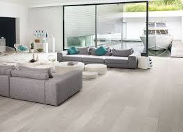 How To Choose The Ideal Living Room Floor Grey Laminate Flooring Living Room Flooring Laminate Flooring Basement