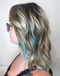If your brown hair has started to gray, you may want to consider blending your gray with blonde highlights rather than opting to color your entire head. 25 Cutest Peekaboo Highlights You Ll See In 2020