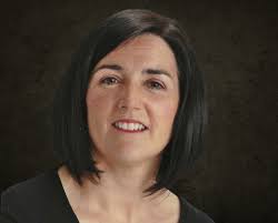 Anne Barry celebrates the College's international identities through song