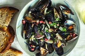 Moules A La Normande Normandy Style Mussels Wine Enthusiast Recipe Mussels International Recipes Cooking
