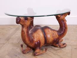 Solid hardwood timber and brass and steel. Camel Coffee Table Drew Pritchard Ltd