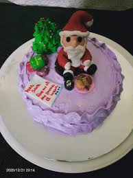 When cutting the cake, bettys recommend using a sharp serrated knife . Santa Christmas Cake In Gurgaon Cakexpo