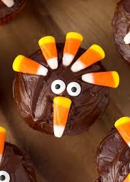 A delicious combination of pumpkin cupcakes, caramel frosting, and ginger cookies, this super cute turkey will be gobbled up in no time. Candy Corn Turkey Thanksgiving Cupcakes Simply Happy Foodie
