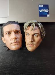 How can I shorten this lower torso? The original upper torso is shorter  than the one I'd like to add, so the new figure looks too tall. I'm  thinking dremel cut the