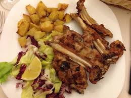 Abbacchio al forno alla romana roast baby lamb, considered a delicacy, takes the place of honor on the italian table. Abbacchio A Scottadito Con Patate Al Forno Picture Of Il Duca Rome Tripadvisor