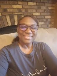 Lounging in her new pjs. She loves them!