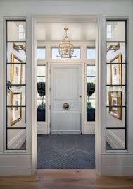 A lift is concealed behind double doors on the left, providing easy access to the top floor. Top 50 Best Entryway Tile Ideas Foyer Designs Home House Design House