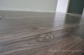 Installing Our Laminate Flooring Our Diy House The Diy Mommy Laminate Flooring Installing Laminate Flooring Tile Installation