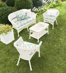 Plastic patio furniture is one of the most inexpensive options. Easy Care Resin Wicker Love Seat Chairs And Coffee Table Set Plowhearth