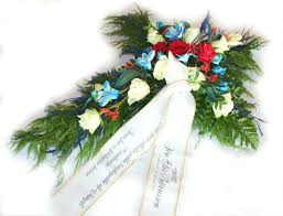 Bounds funeral home offers 8,000 square feet of space that includes comfortable arrangement rooms, a viewing room with a fireplace and a chapel that seats up to 200 guests with adjacent family and clergy rooms. Beautifuly Decorated Funeral Cross With White And Red Roses Blue Flowers And More 70cm I Husi Bloma Flower Delivery Shop Iceland