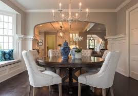 A Centerpiece In This Dining Room Is A Round Wooden Mahogany Dining Table With Gorgeous Bei Mahogany Dining Table Round Dining Room Table Informal Dining Rooms