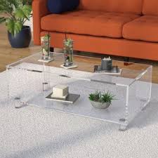 Complete your living room ensemble in modern style with this contemporary coffee table. Clear Acrylic Glass Coffee Table Redboth Com Coffee Table Acrylic Coffee Table Coffee Table Design