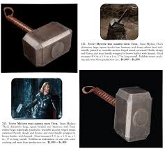 There are 100cm in a meter, and judging by how far the armor plates stick out from the spartan's body, i'd say the average thickness of the mjolnir is about 1 cm (a little less than 1/2in). What Is The Prop For Thor S Hammer Mjolnir Made Of Science Fiction Fantasy Stack Exchange