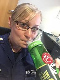 Great Pyrenees dog drinking water after brushing
