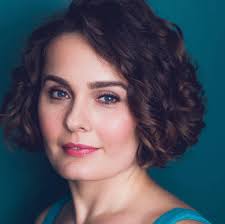 Ashley Emerson, soprano added a...