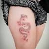 Dragon flower tattoos usually signify deception (through the concealment of something) and grace. 1